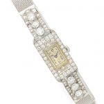 AN ART DECO PLATINUM AND DIAMOND WRISTWATCH