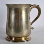 A 1930S ENGLISH SILVER TANKARD