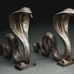 PAIR OF COBRA ANDIRONS