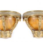 A PAIR OF ART DECO GILT-BRONZE AND ALABASTER LIGHT FITTINGS, CIRCA 1928