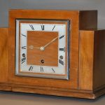 Wooden-Cased, Quarter-Chiming Mantel clock