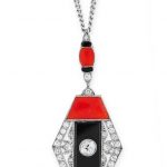 AN ART DECO DIAMOND, CORAL AND ONYX PENDANT, BOUCHERON