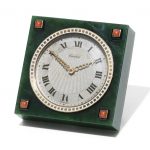 AN ART DECO NEPHRITE, GEM-SET AND ENAMEL DESK CLOCK, BY CARTIER, CIRCA 1920