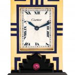 ART DECO ONYX, ENAMEL AND RUBY 'MIGNONETTE' CLOCK, CARTIER