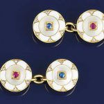 A pair of Art deco ruby diamond and enamel cufflinks