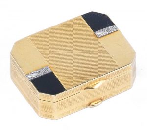 AN ART DECO DIAMOND-SET GOLD PILL BOX circa 1940