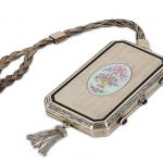 An early 20th century American Art Deco sterling silver and enamel minaudiere