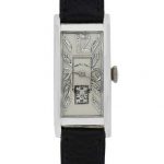 AN ART DECO PLATINUM RECTANGULAR WRISTWATCH WITH DIAMOND SET INDEXES CIRCA 1925