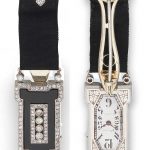 CHAUMET: ART DECO ONYX AND DIAMOND FOB WATCH, CIRCA 1925